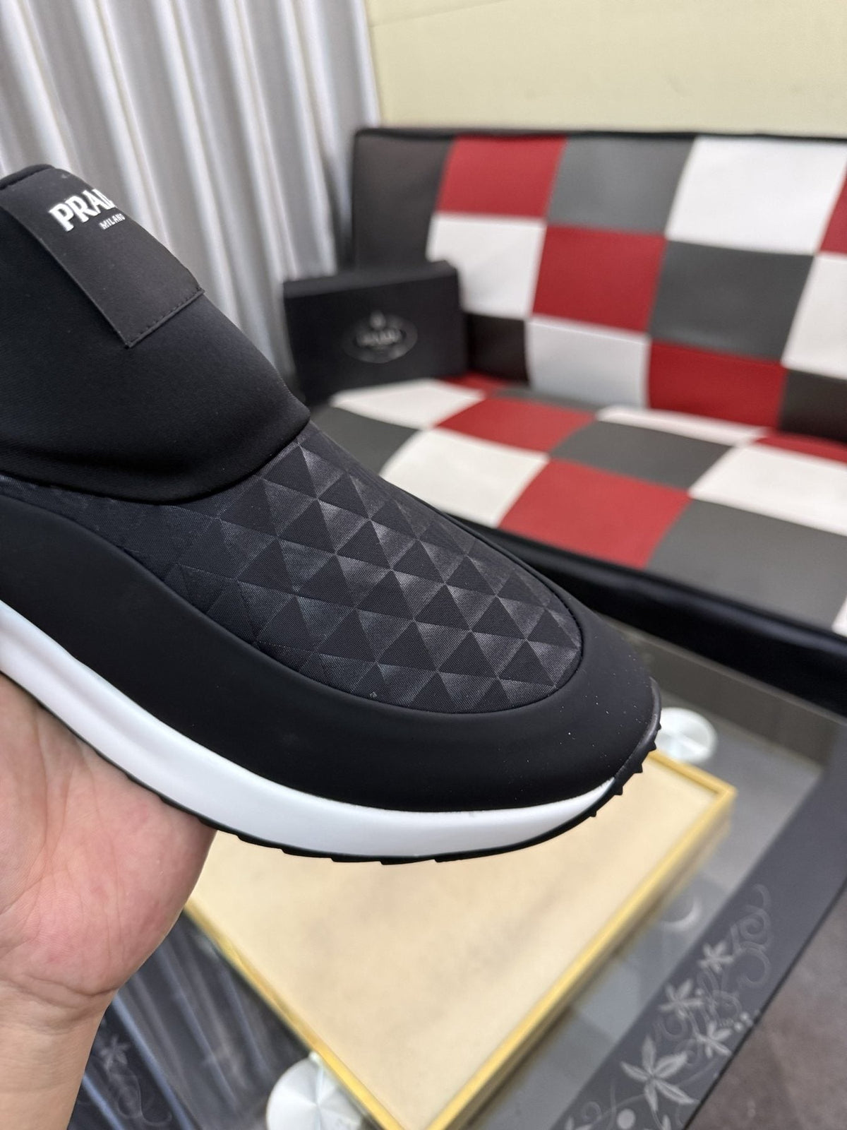Prada Textured Slip-On Sneakers — detail