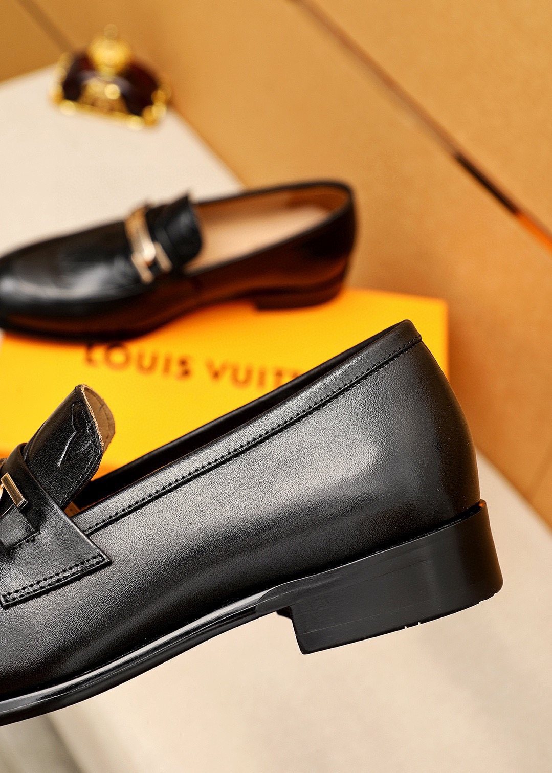 Louis Vuitton Embossed Metal-Bar Loafers — back