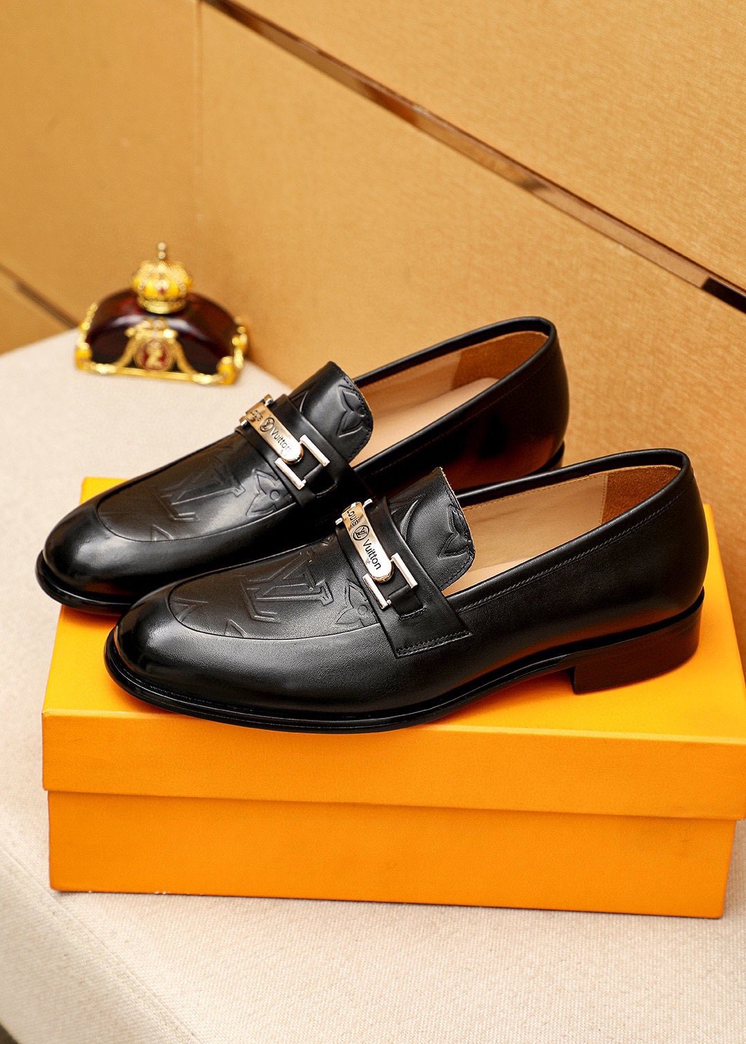 Louis Vuitton Embossed Metal-Bar Loafers — model